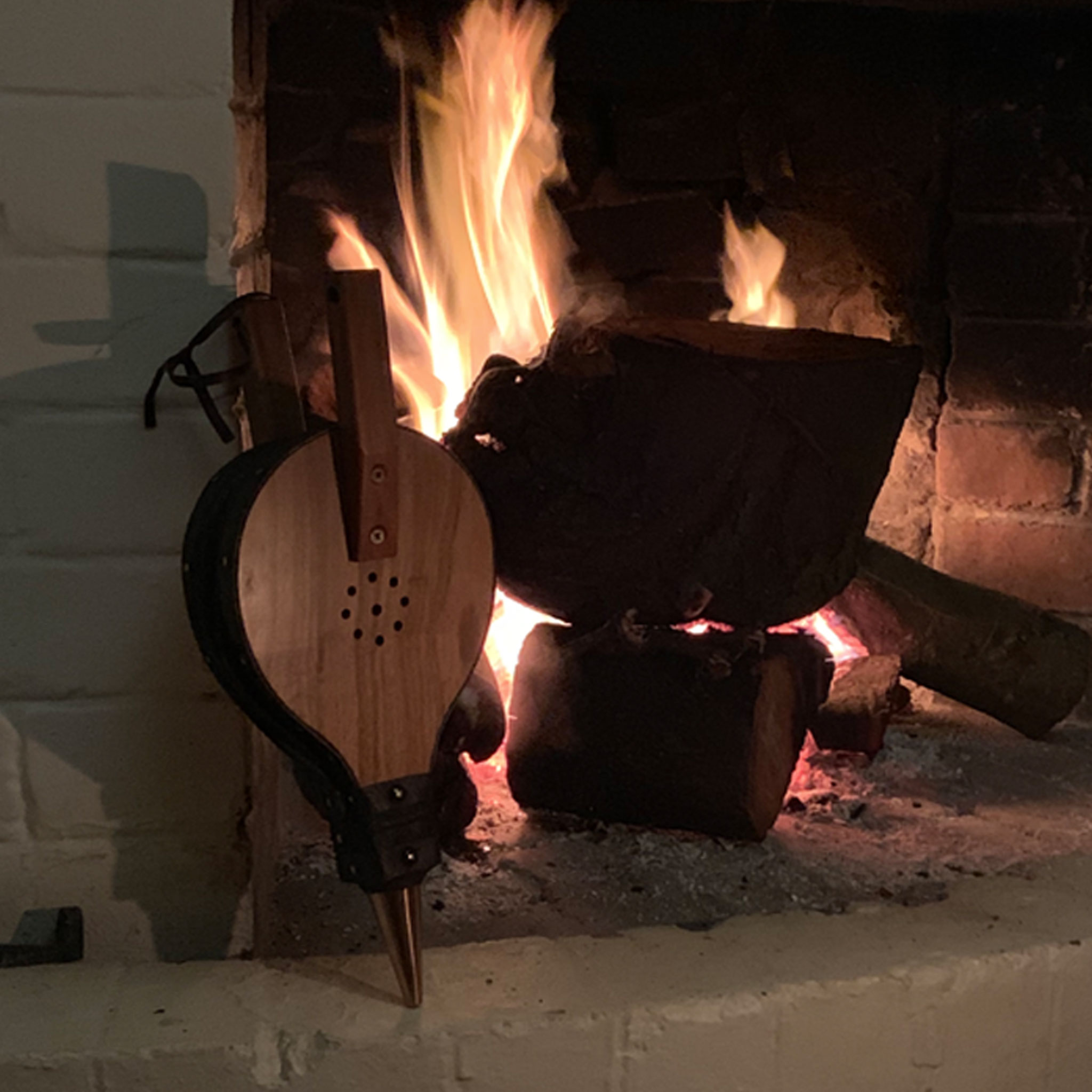habilis-bellows-at-the-fire-side.jpg